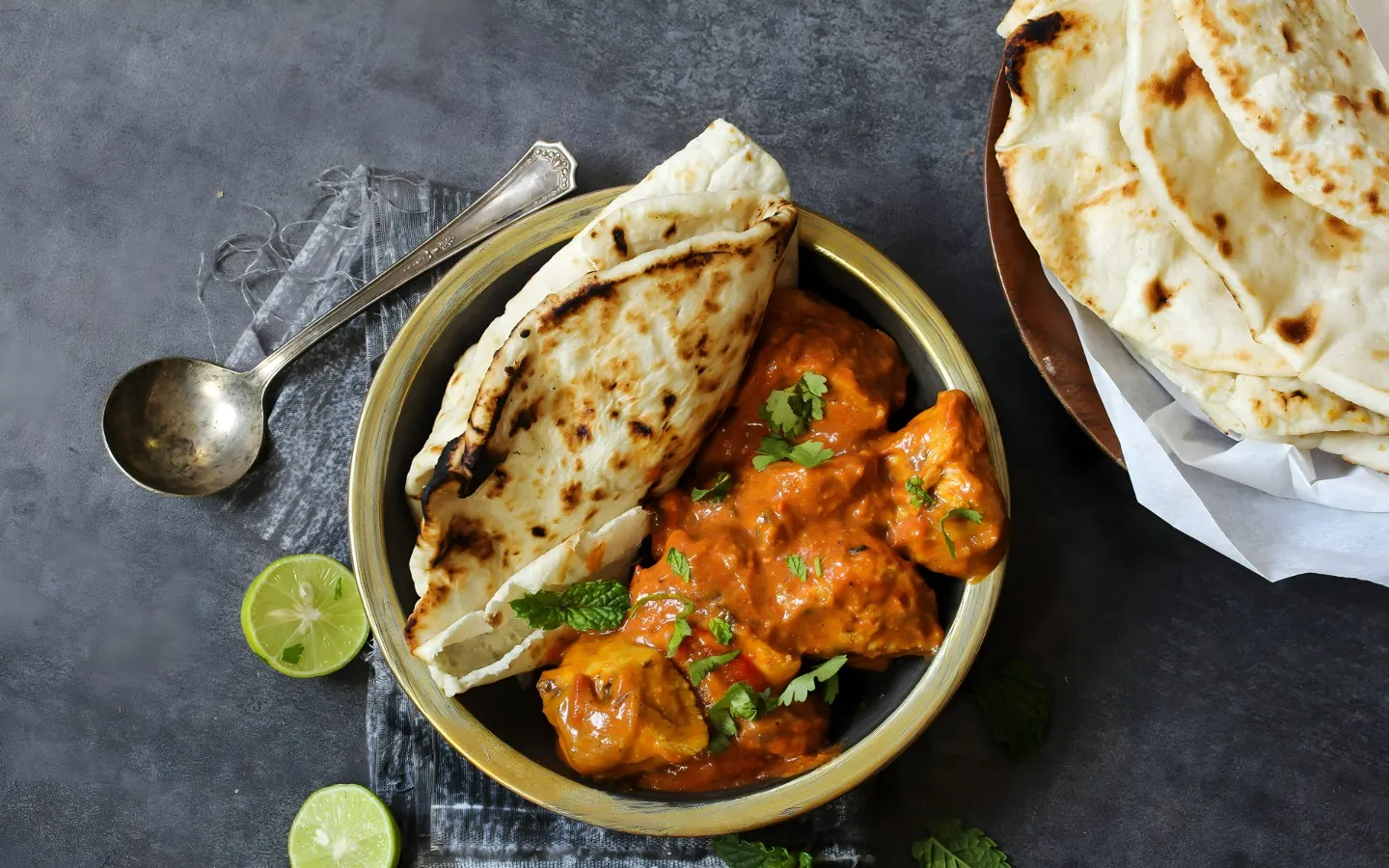 Spice Affair signature dishes Butter ChickenLamb ChopsGarlic Naan
